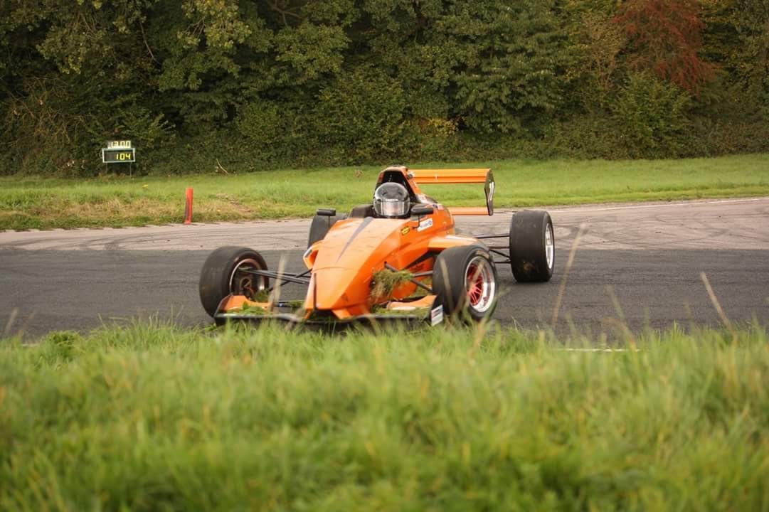 Pete's car covered in grass following his off