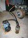 My patented brake bleeding system, using a vacuum pump